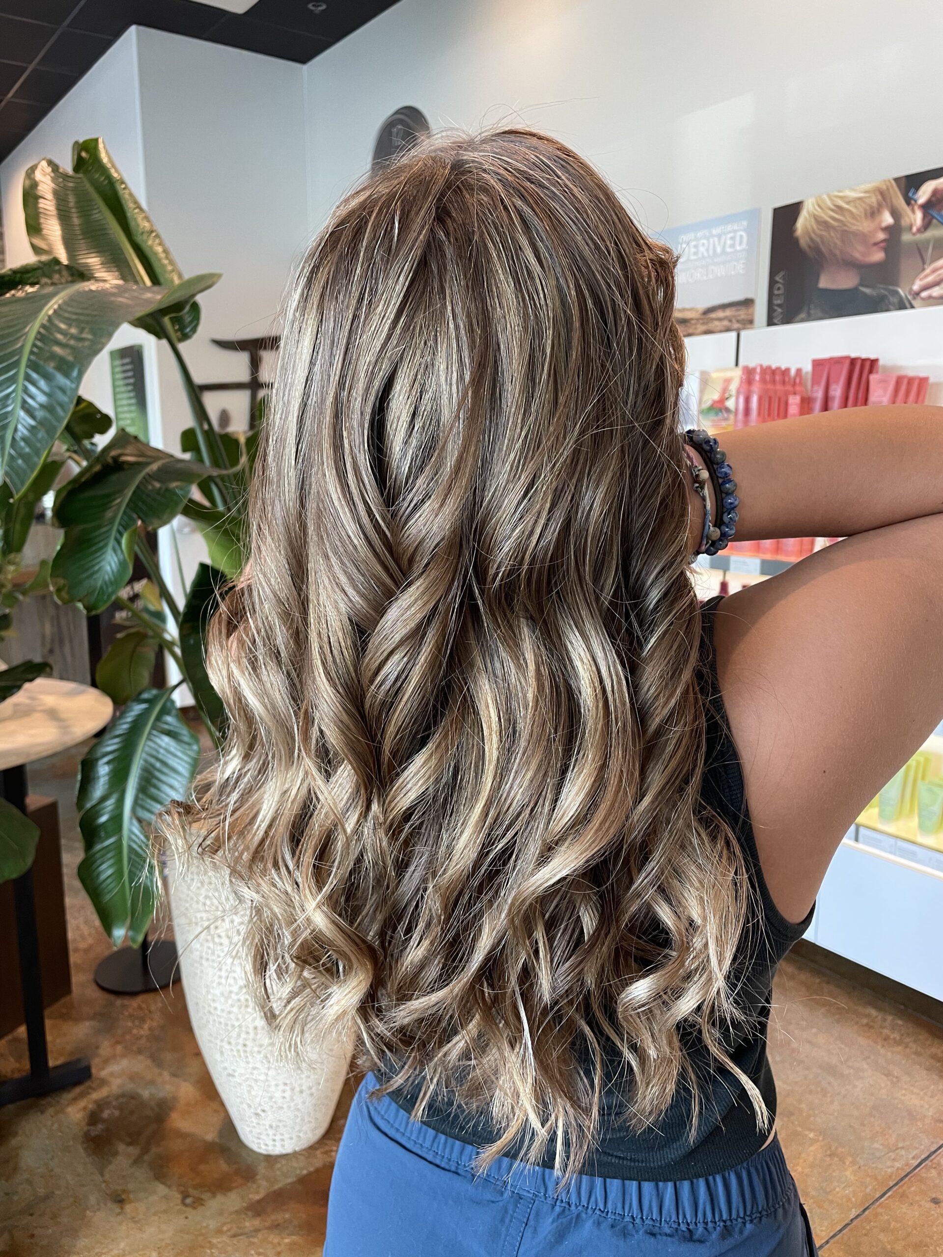 Woman with curly brunette hair