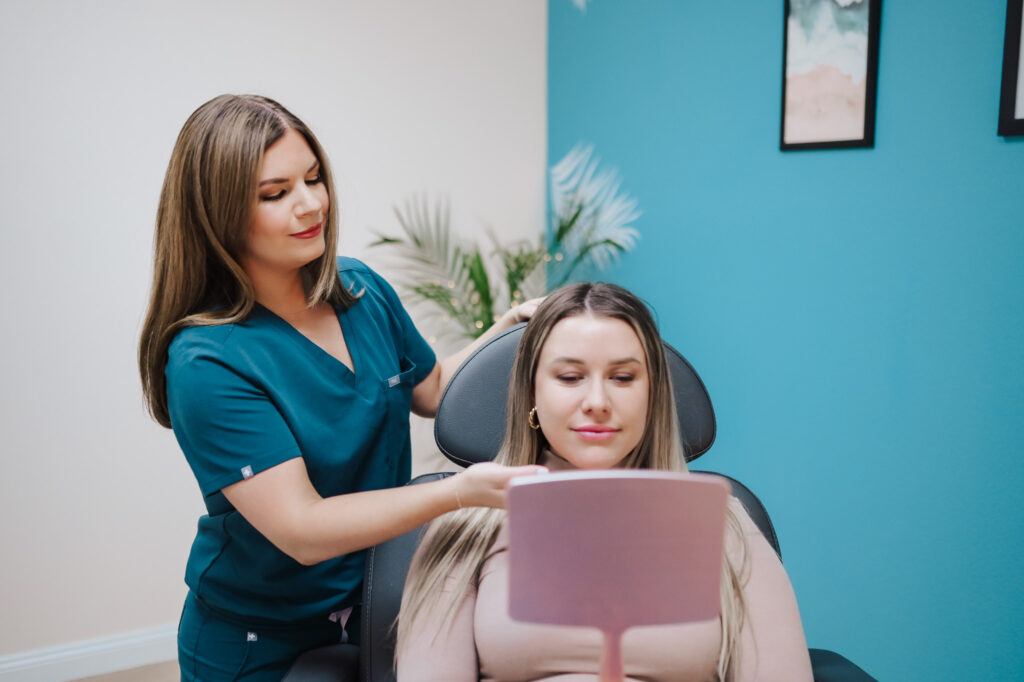 a woman gets a consultation for the DermaV laser treatment